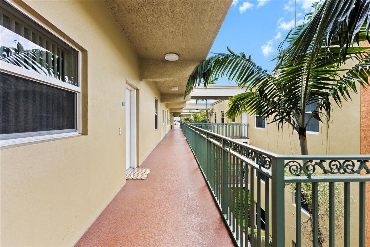 Welcome to your top-floor retreat in the heart of West Palm Beach! This spacious 2BR/2BA condo offers soaring ceilings, marble floors, and abundant natural light. The kitchen features stainless steel appliances, granite counters, pull-out pantry storage, and ample cabinetry. The primary suite includes a spa-like bath with jetted tub, separate shower, vanity, and three closets. Enjoy the oversized balcony with pool and city views, or take advantage of community amenities including gated entry, lobby with receptionist, pool, sauna, and business center in progress. See supplement for location highlights.