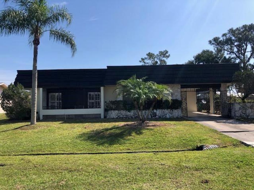 Photo of 771 SE Floresta Drive, Port Saint Lucie, FL 34983 (MLS # R10707972)