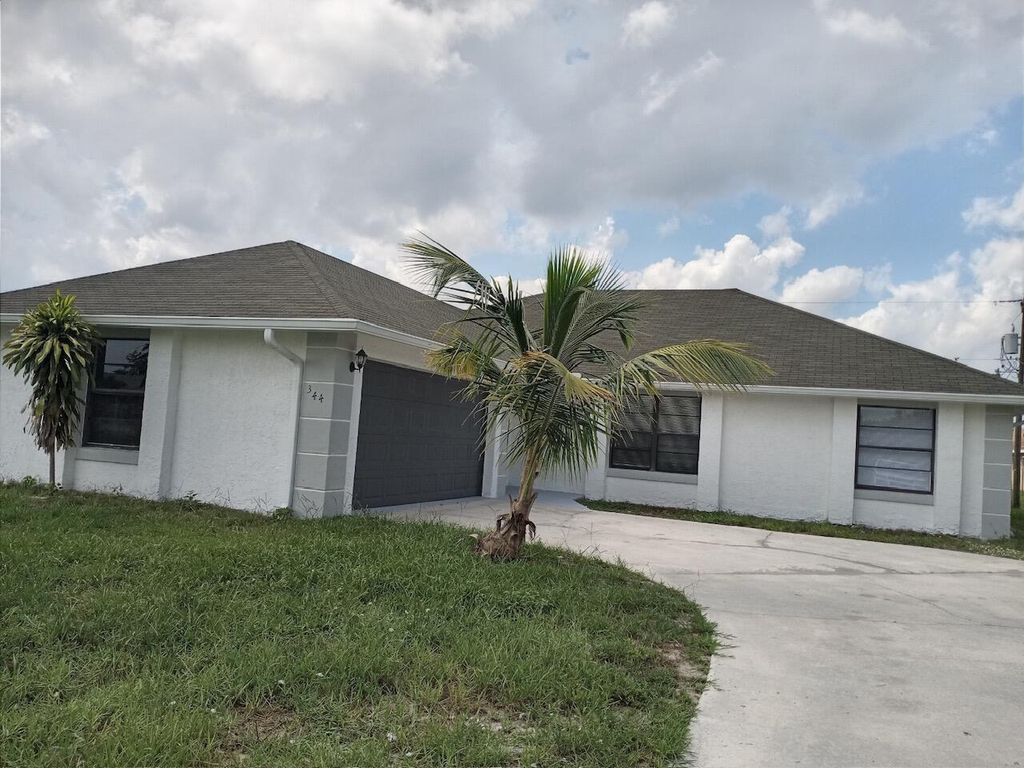 Photo of 344 SE Inwood Avenue, Port St Lucie, FL 34984 (MLS # R10925119)