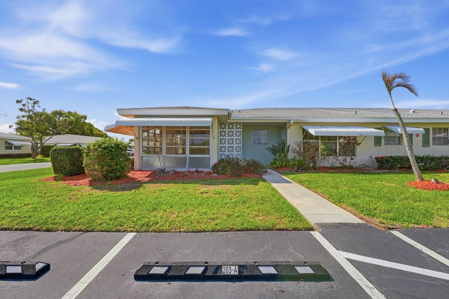 Fully renovated 2 bedroom, 2 bathroom corner villa located across from the pool in Fort Pierce's premier 55+ gated community. Showcasing its new modern luxury finishes featuring a gourmet kitchen with 42 " inch cabinets, quartz countertops, subway tile backsplash, & sleek stainless steel appliances. 24x24 Porcelain tile flooring & 6 in base molding throughout w/ 4 inch molding around doors/entryways & all new lighting throughout. Bathrooms feature porcelain tile flooring & walls w/ vessels sinks. Both front & back doors have been upgraded to impact. The in unit laundry features a luxury washer/dryer combo. HOA covers cable, high-speed fiber-optic internet, water, sewer, trash, law-care & 24-hour manned security. Heated pool, tennis & pickleball courts, shuffleboard, & a clubhouse w/ a full social calendar of bingo & clubs. Enjoy catch-and-release fishing on the community lake. Located within 10 minutes to the beautiful beaches of Hutchinson Island.