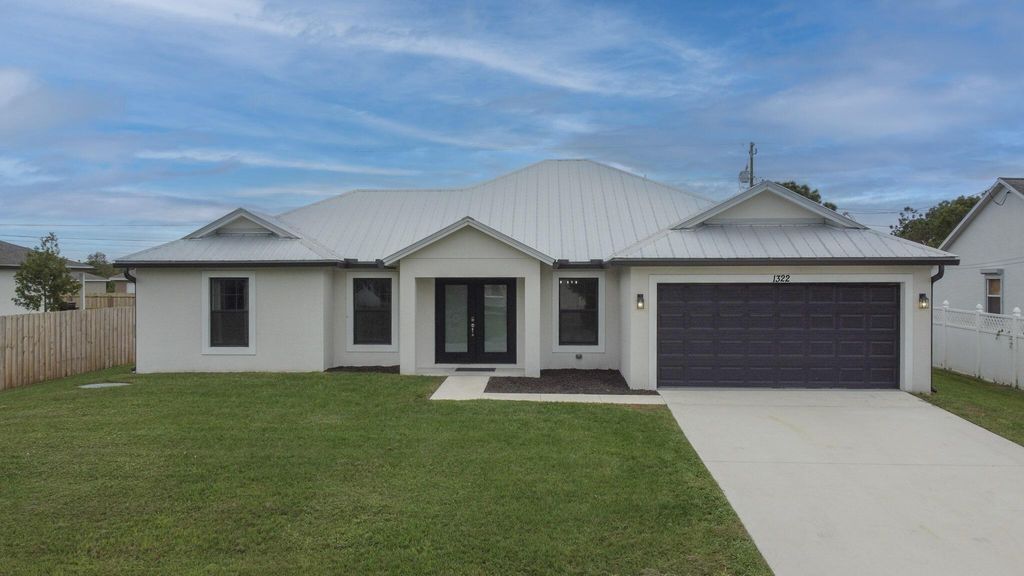 Photo of 1322 SW Calmar Avenue, Port Saint Lucie, FL 34953 (MLS # R11055206)