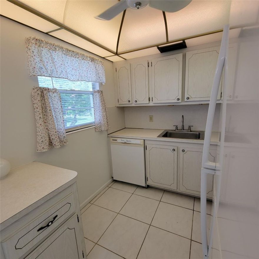 LIGHT AND BRIGHT CORNER, 2/1.5, 2ND FLOOR (LIFT IN BLDG.) IN QUIET PRESCOTT AREA.  Tiled throughout, white appliances, enclosed patio and a clean palette to design your dream home!  North/South orientation.  Near West Drive for easy access. Century Village offers a wide range of amenities to keep you busy including over 100 clubs, 17 pools, 10 pickleball courts, 7 tennis courts, FREE MOVIES, FREE TRANSPORTAION, FREE GYM AND CLASSES, FREE SATURDAY NIGHT DANCES, a 9-hole putting course, bocce ball, volley ball, shuffleboard, petanque and the list goes on and on.  Come to Century Village to live and add years to your life!