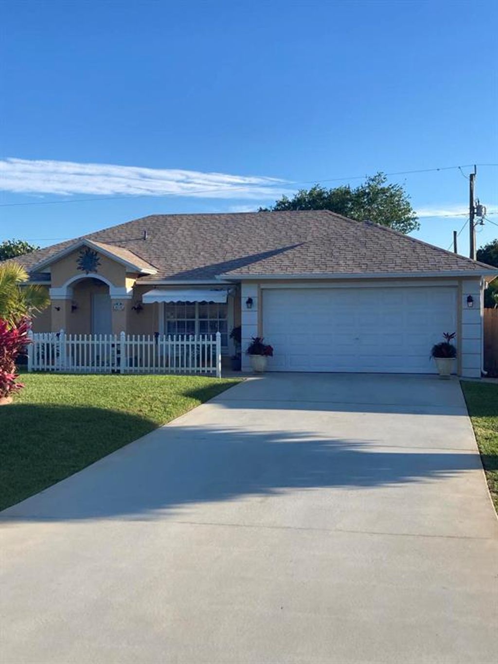 Photo of 618 SE Thanksgiving Avenue, Port St Lucie, FL 34984 (MLS # R10875931)