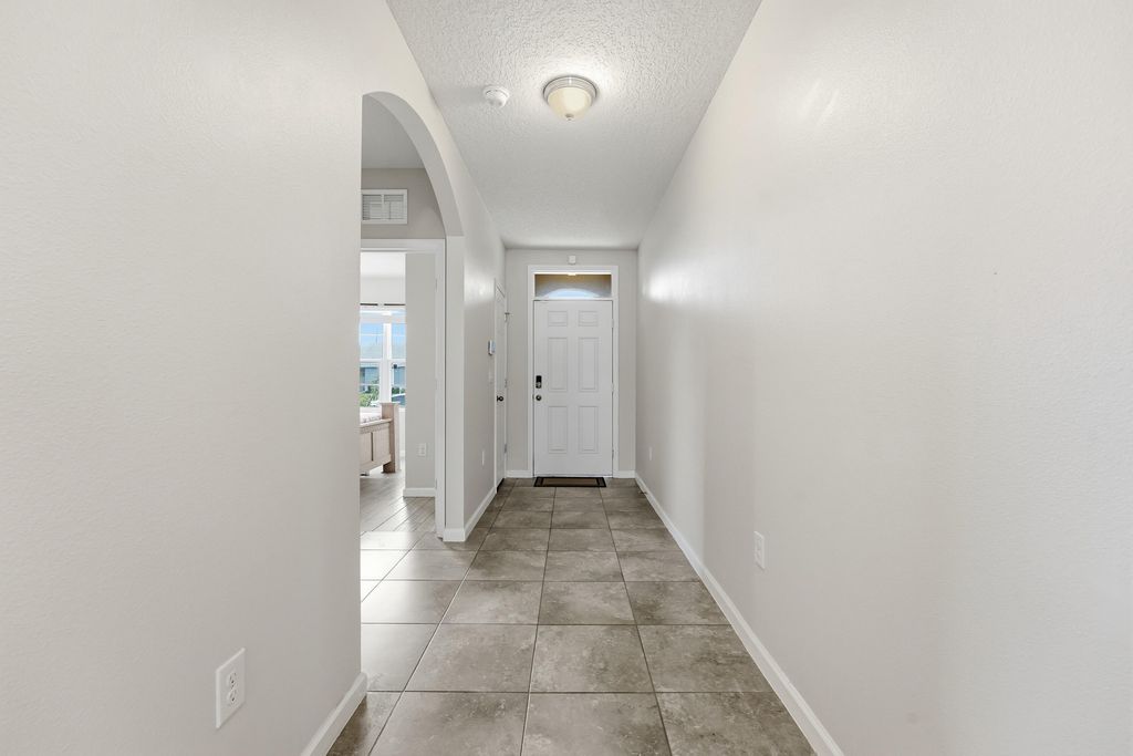 Photo of 1031 SW Alexandria Avenue, Port Saint Lucie, FL 34953 (MLS # B26018615)