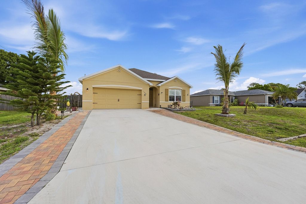 Photo of 1031 SW Alexandria Avenue, Port Saint Lucie, FL 34953 (MLS # B26018615)
