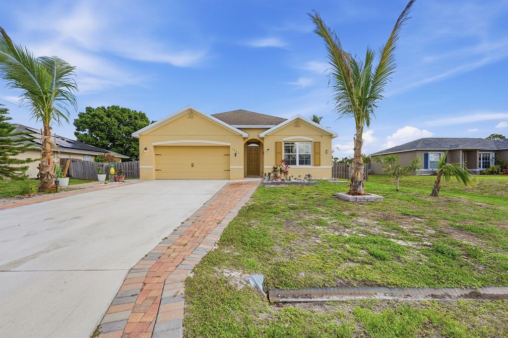 Photo of 1031 SW Alexandria Avenue, Port Saint Lucie, FL 34953 (MLS # B26018615)
