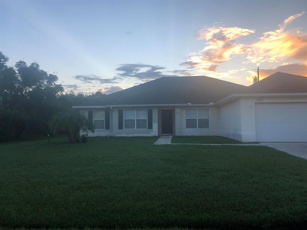 Photo of 1341 SE Ladner Street, Port Saint Lucie, FL 34983 (MLS # R10833348)