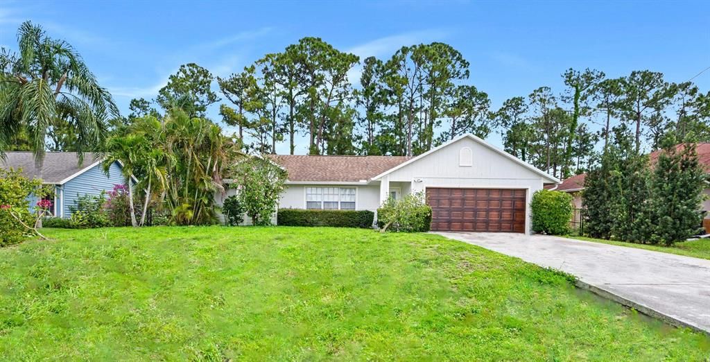 Photo of 2943 SW Collings Drive, Port St Lucie, FL 34953 (MLS # R10885652)