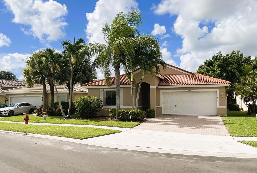 Photo of 5189 Prairie Dunes Village Circle, Lake Worth, FL 33463 (MLS # R11114013)
