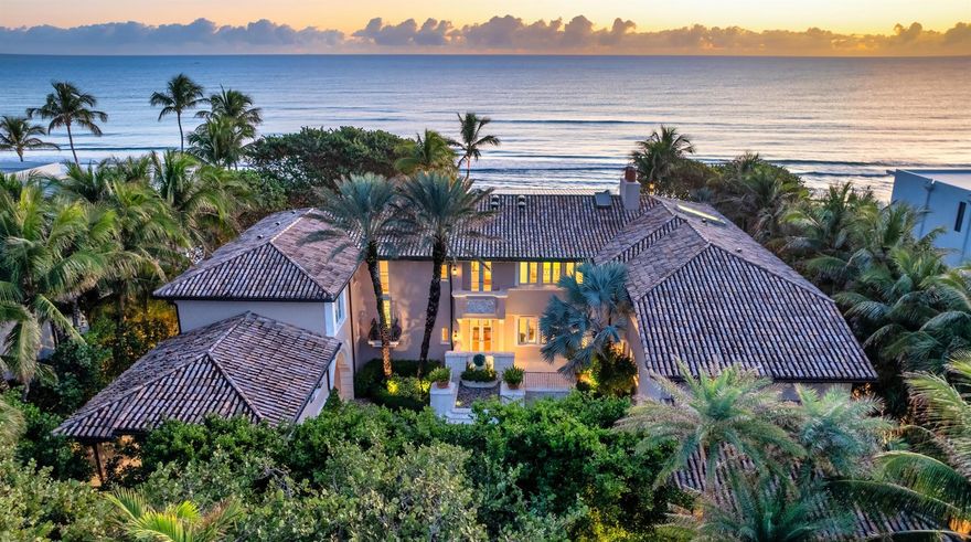With intrinsic style, warmth and serenity, this highly private bespoke estate rivals the great villas of Lake Como. From the tropical canopy that frames its meandering cobblestone drive to the blush tone facade of its gracious exterior, it is readily apparent that this is a residence designed for pleasure, comfort and ease. Here every main room provides expansive ocean views with photogenic designer finishes, and large interior walls perfect for the serious collector of art. The rustic sophistication that prevails reflects renowned Interior Designer John Saladino's preference for mixing intimate and grand scale.