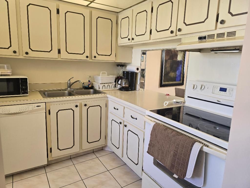 Photo of 118 Lake Olive Drive, West Palm Beach, FL 33411 (MLS # R11158996)