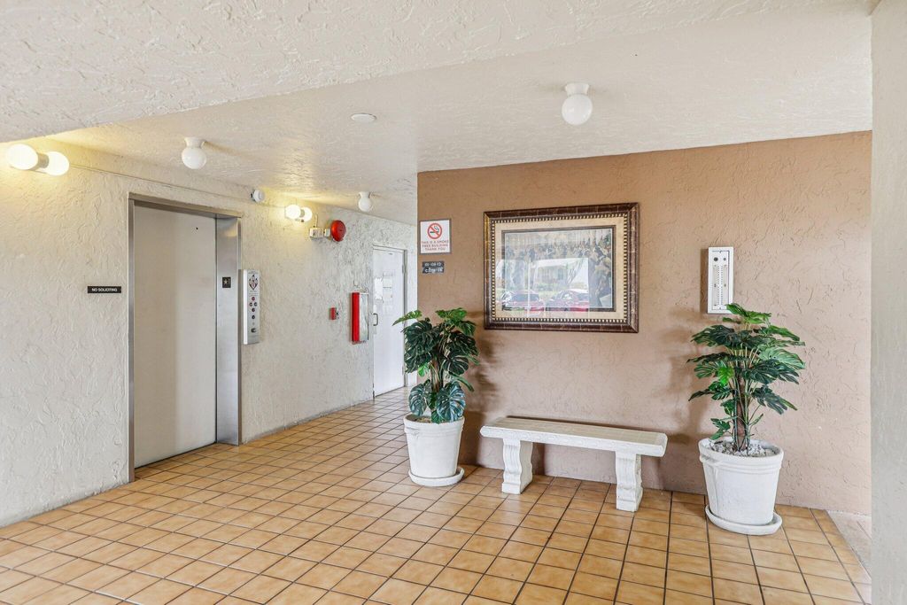 Photo of 3178 Via Poinciana Dr #305, Lake Worth, FL 33467 (MLS # R11165581)