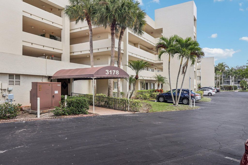 Photo of 3178 Via Poinciana Dr #305, Lake Worth, FL 33467 (MLS # R11165581)