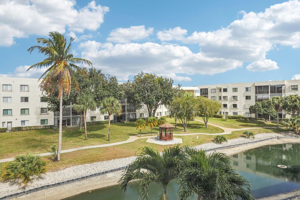 Photo of 3178 Via Poinciana Dr #305, Lake Worth, FL 33467 (MLS # R11165581)