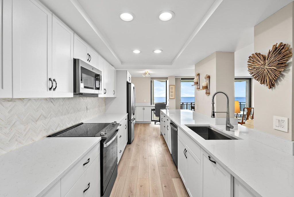 Photo of 5460 N Ocean Drive #3b, Riviera Beach, FL 33404 (MLS # R10997060)