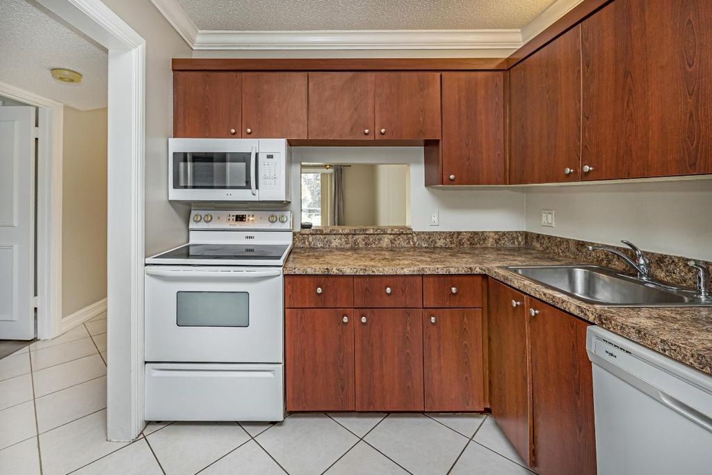 Photo of 2700 Casita Way #204, Delray Beach, FL 33445 (MLS # R11140271)