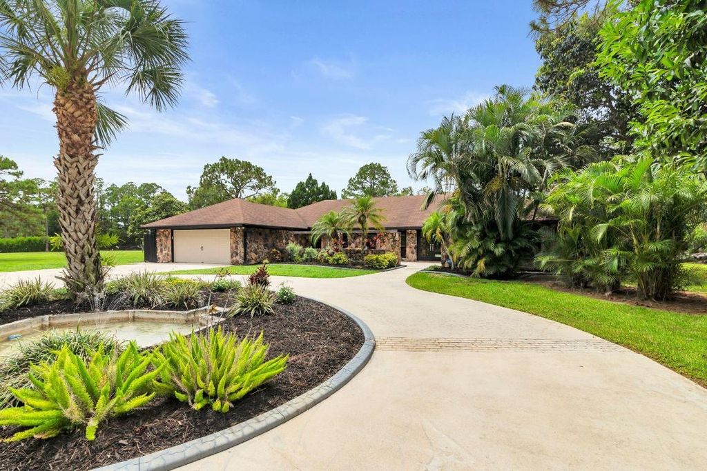 Photo of 14101 Wind Flower Drive, Palm Beach Gardens, FL 33418 (MLS # R11099584)