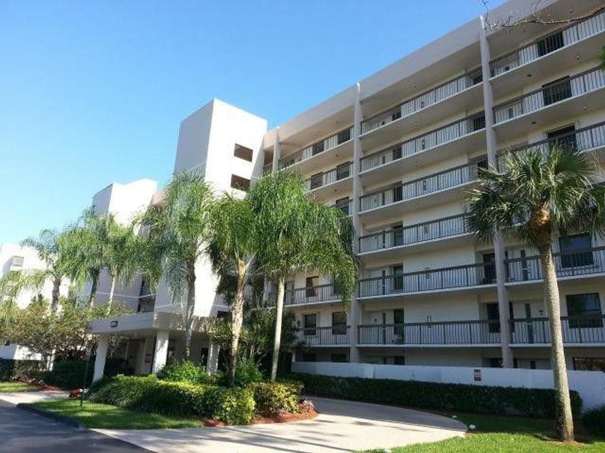 Move-in Ready Condo with Stunning Views! Beautifully maintained and spacious 2-bedroom, 2-bath rental, featuring neutral tones and stylish laminate flooring throughout. Enjoy serene outdoor living on the screened-in patio, offering picturesque views — perfect for morning coffee or evening relaxation. The updated kitchen is a chef's delight with sleek stainless steel appliances, granite countertops, and ample cabinetry. A wet bar in the living room adds an elegant touch, ideal for entertaining guests. The master suite offers double sinks and a spacious layout, while the convenience of an in-unit, full-size washer and dryer adds to the comfort of daily living.  Don't miss the opportunity to live in this bright and airy home that combines functionality with charm!