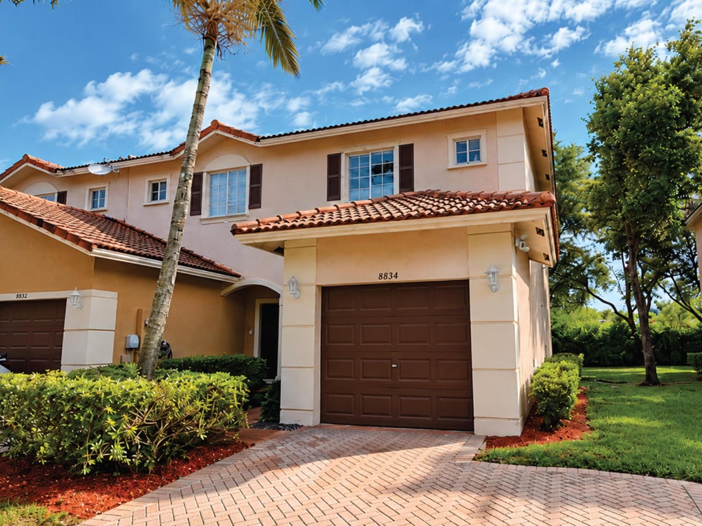 Photo of 8834 S ISLES Circle, Tamarac, FL 33321 (MLS # B26094434)