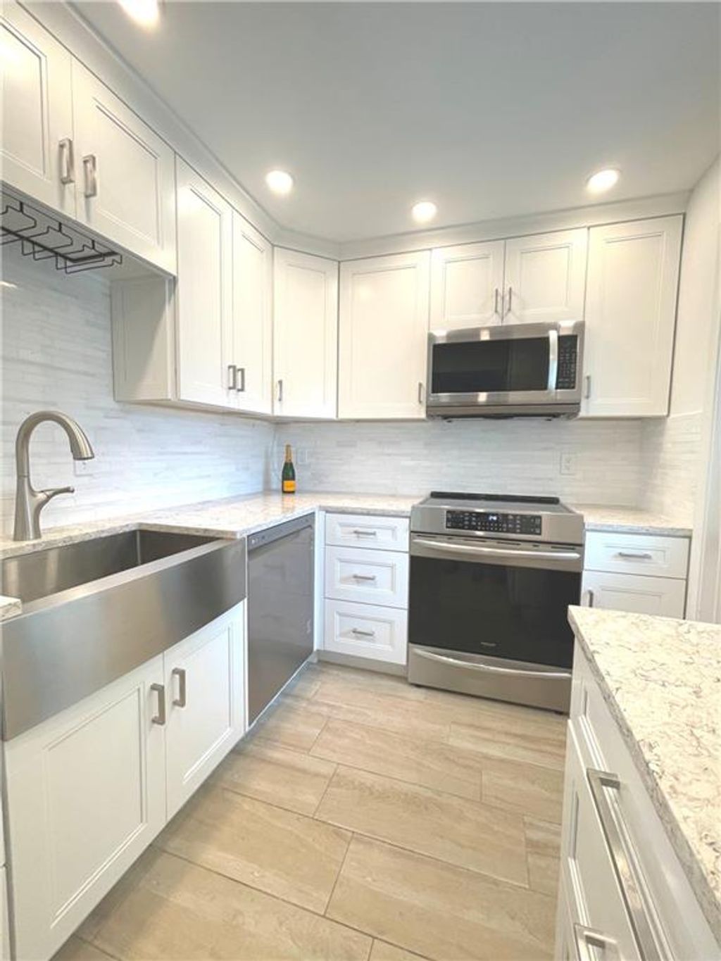 Photo of 5540 Tamberlane Cir #215, Palm Beach Gardens, FL 33418 (MLS # F10324653)