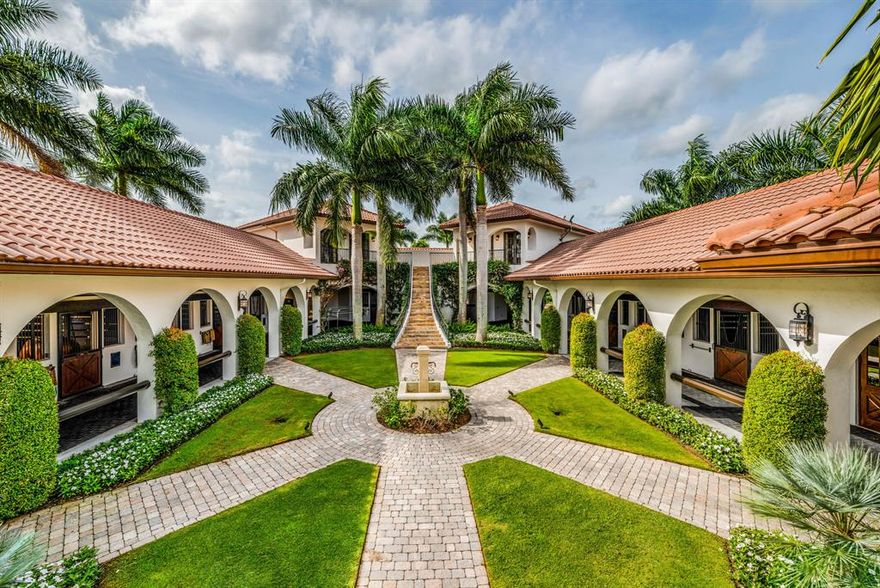 Professional Grand Prix Village facility minutes from the ring. 14 stalls, multiple grooming stalls, indoor and outdoor wash stalls, 6 paddocks and a 235' x 115' all weather arena. Large tackroom, multiple feed rooms, laundry room, two bay garage for tractors and storage, groom's lounge with kitchen, owner's lounge, rider's lounge and staff apartments complete the amenities. The owner's lounge with incredible timber ceiling and Saltillo tile offers a full kitchen with Wolf gas range, Subzero refrigerator, and Miele dishwasher. A full bathroom and expansive view of the ring complete this space. An outdoor patio with built in Wolf grill, ice maker and mini fridge overlooks the ring for prime views while entertaining!