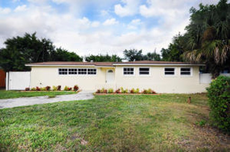 Large home with open floor plan - completely renovated 3/2 with Large Enclosed Den.  Brand new appliances; new paint and light fixtures. Come live in or turn into an investment property. -HURRY & MAKE OFFER - Easy to show VACANT-