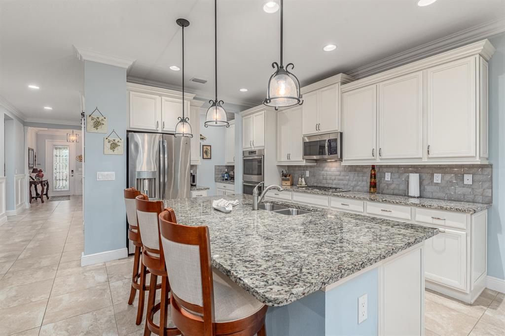 Photo of 9608 SW Royal Poinciana Drive, Port Saint Lucie, FL 34987 (MLS # R10689787)