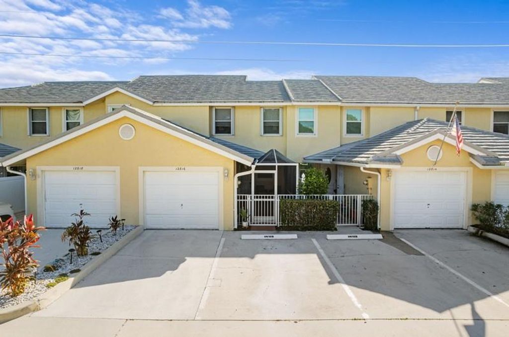 Photo of 12816 Woodmill Dr, Palm Beach Gardens, FL 33418 (MLS # F10532150)