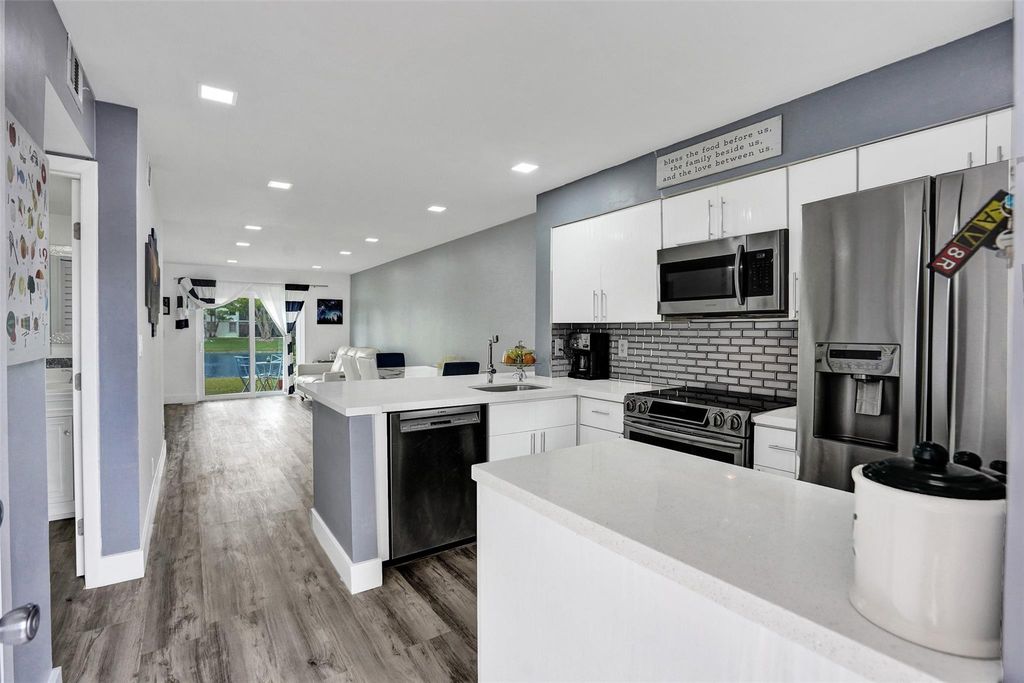Photo of 2106 S Cypress Bend Drive #101, Pompano Beach, FL 33069 (MLS # F10441566)