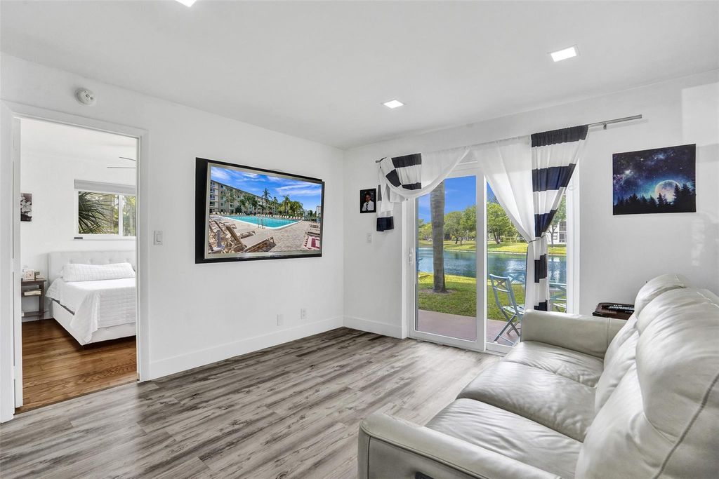 Photo of 2106 S Cypress Bend Drive #101, Pompano Beach, FL 33069 (MLS # F10441566)
