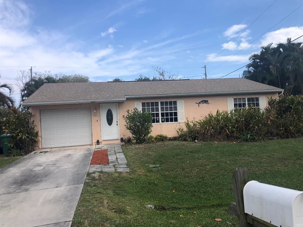 Photo of 2289 SE Friendship Street, Port Saint Lucie, FL 34952 (MLS # R10783646)