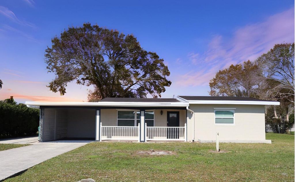 Photo of 615 Beach Avenue, Port Saint Lucie, FL 34952 (MLS # R11053340)