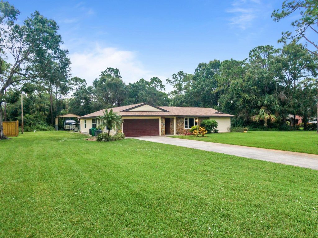 Photo of 8480 Hidden Pines Road, Fort Pierce, FL 34945 (MLS # R11111335)