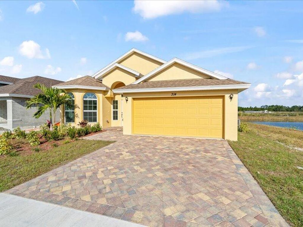 Photo of 314 Silver Sands Lane, Fort Pierce, FL 34945 (MLS # R11146119)