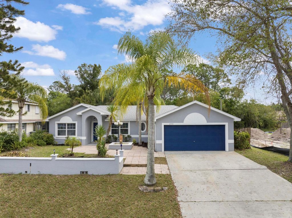 Photo of 8978 101st Avenue, Vero Beach, FL 32967 (MLS # R10967819)