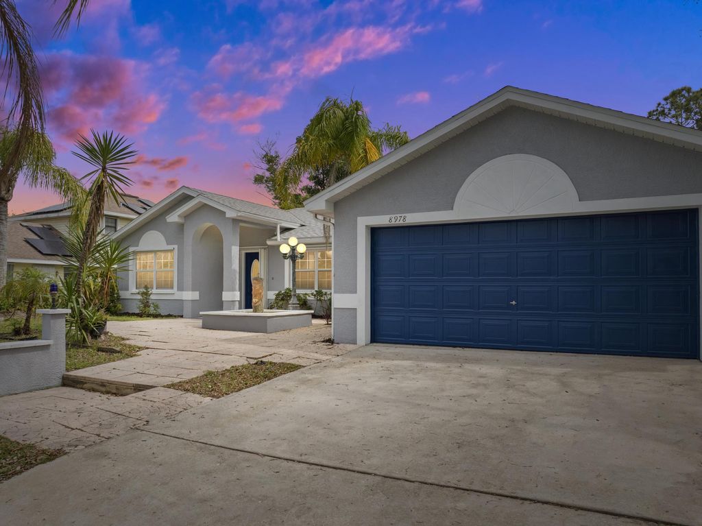 Photo of 8978 101st Avenue, Vero Beach, FL 32967 (MLS # R10967819)