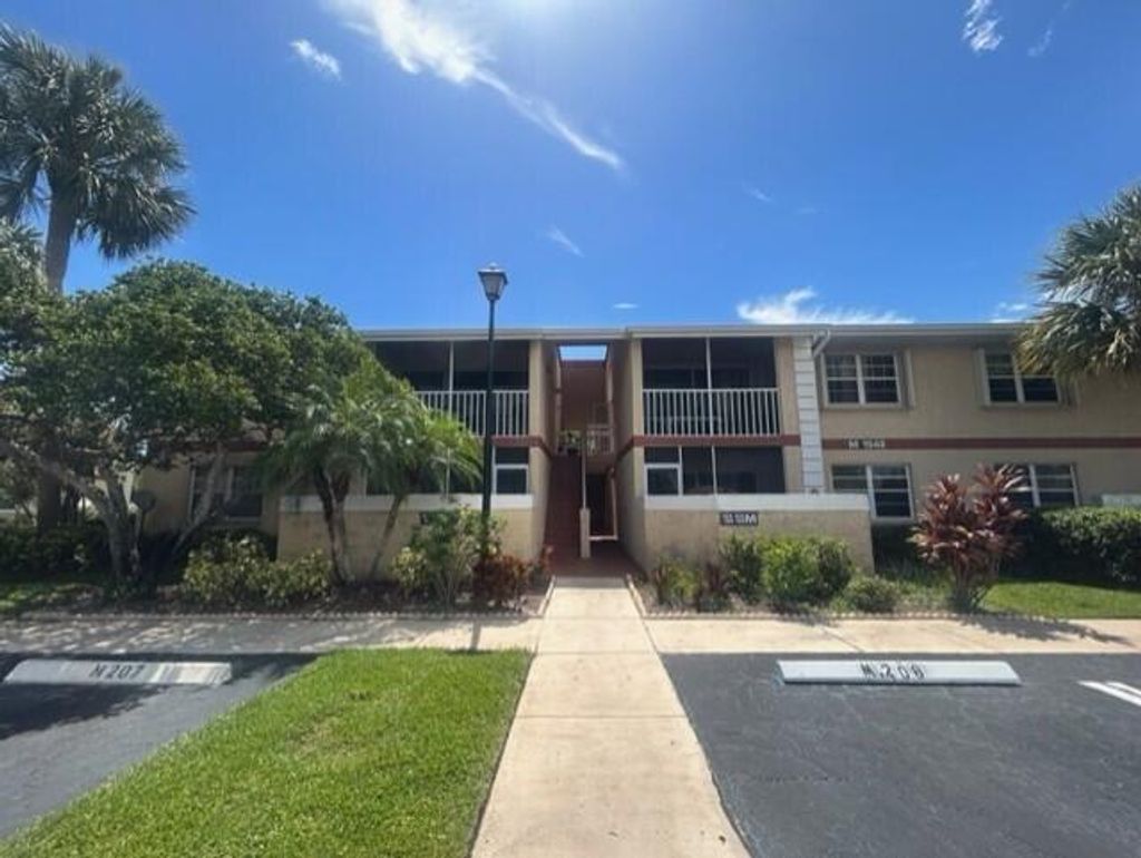 Photo of 1548 SE Royal Green Circle #206, Port St Lucie, FL 34952 (MLS # R10907872)