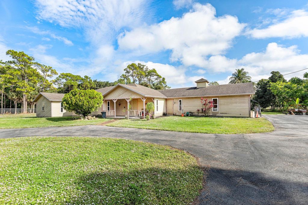 Photo of 5180 Royal Palm Beach Boulevard, The Acreage, FL 33411 (MLS # R11146909)