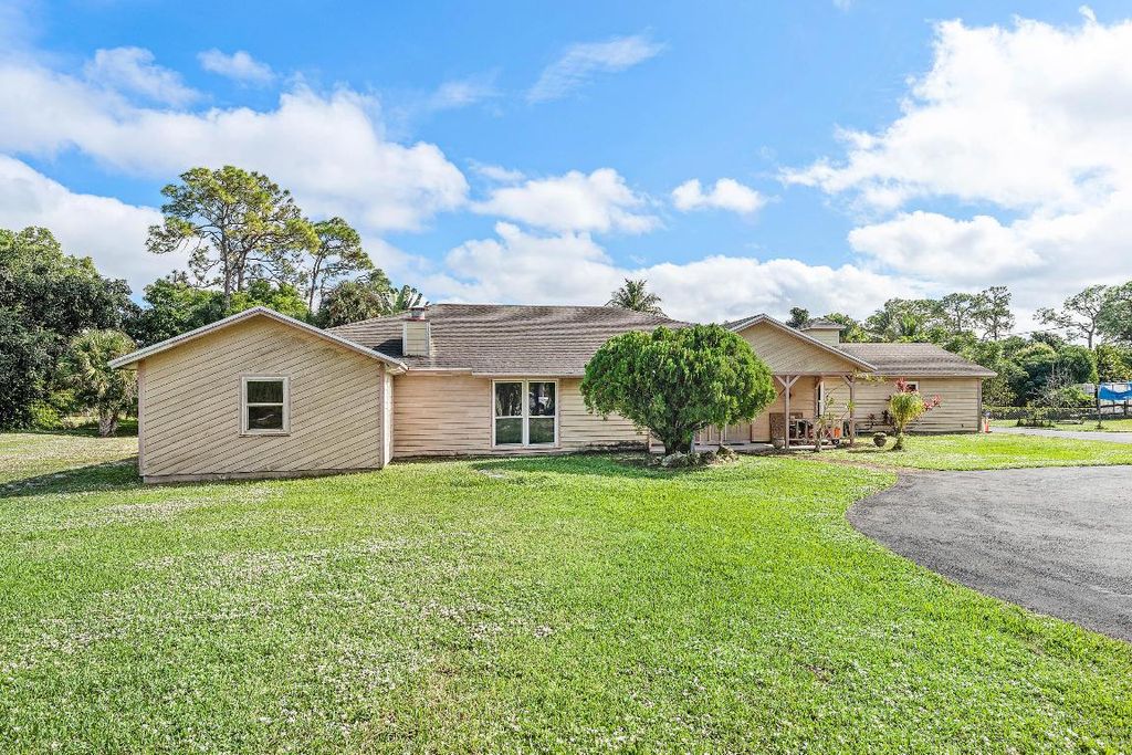 Photo of 5180 Royal Palm Beach Boulevard, The Acreage, FL 33411 (MLS # R11146909)