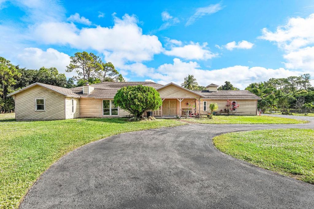 Photo of 5180 Royal Palm Beach Boulevard, The Acreage, FL 33411 (MLS # R11146909)