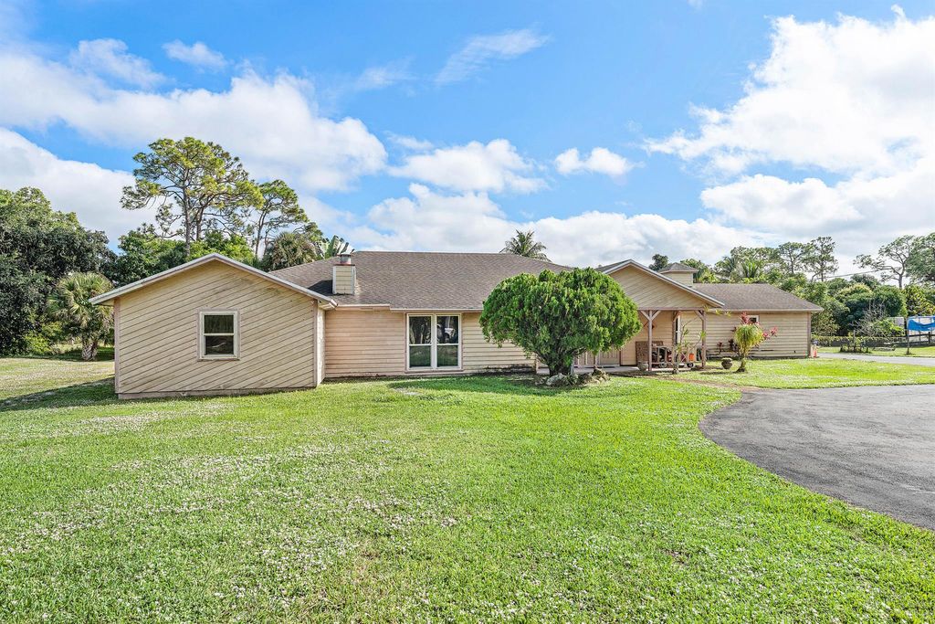Photo of 5180 Royal Palm Beach Boulevard, The Acreage, FL 33411 (MLS # R11146909)