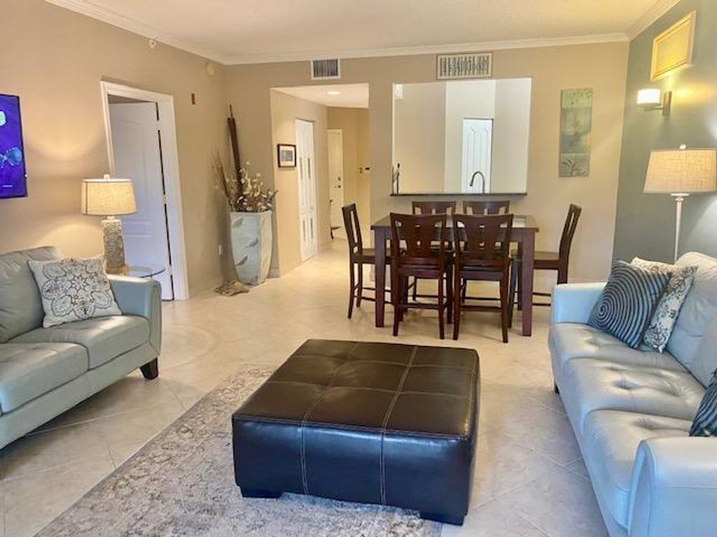 Photo of 400 Uno Lago Drive #304, Juno Beach, FL 33408 (MLS # R10716432)
