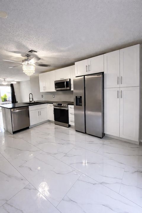 Tiny photo for 6770 Dupere Lane, Lake Worth, FL 33467 (MLS # R11163064)