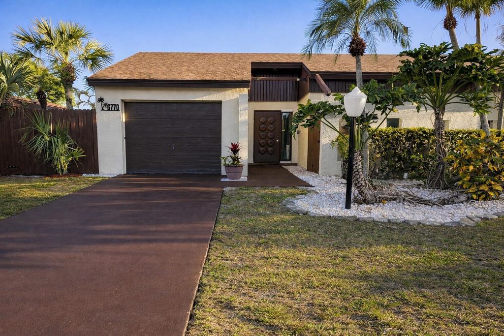 Photo of 6770 Dupere Lane, Lake Worth, FL 33467 (MLS # R11163064)