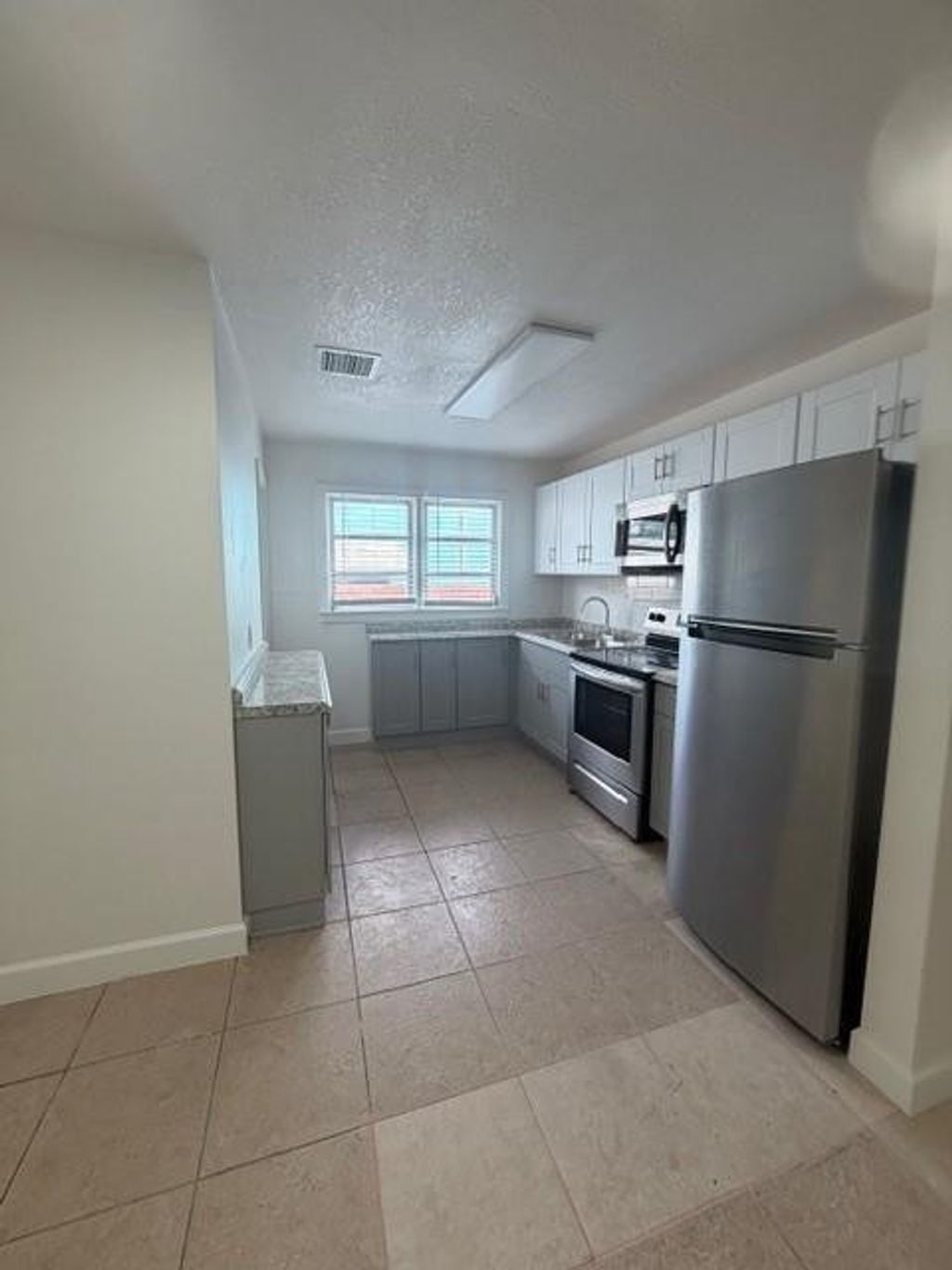 Photo of 701 N E Street #E, Lake Worth Beach, FL 33460 (MLS # F10549340)