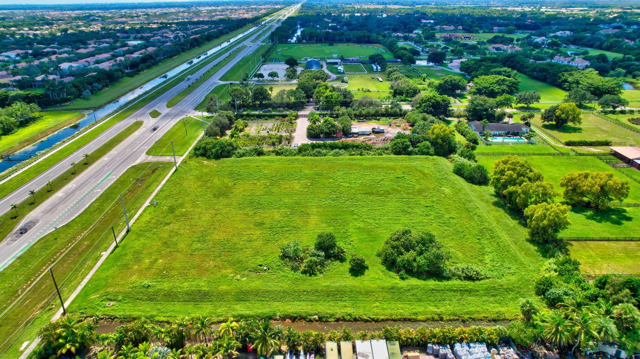 3.63 acres of prime commercial land available for sale, located in what is undoubtedly one of the best locations in Delray Beach, right on 441. The property's strategic positioning offers a unique blend of tranquility and accessibility, making it an ideal choice for a range of potential uses. The evolving landscape of Delray Beach and the surrounding area makes this parcel an attractive investment opportunity for those looking to capitalize on the increasing demand for commercial space. Can be purchased together with the adjacent lot of 2.7 acres