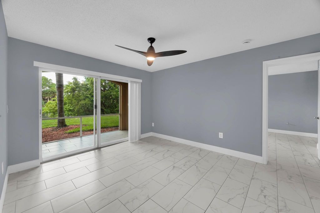 Photo of 3809 NW Mediterranean Ln #104, Jensen Beach, FL 34957 (MLS # F10536805)