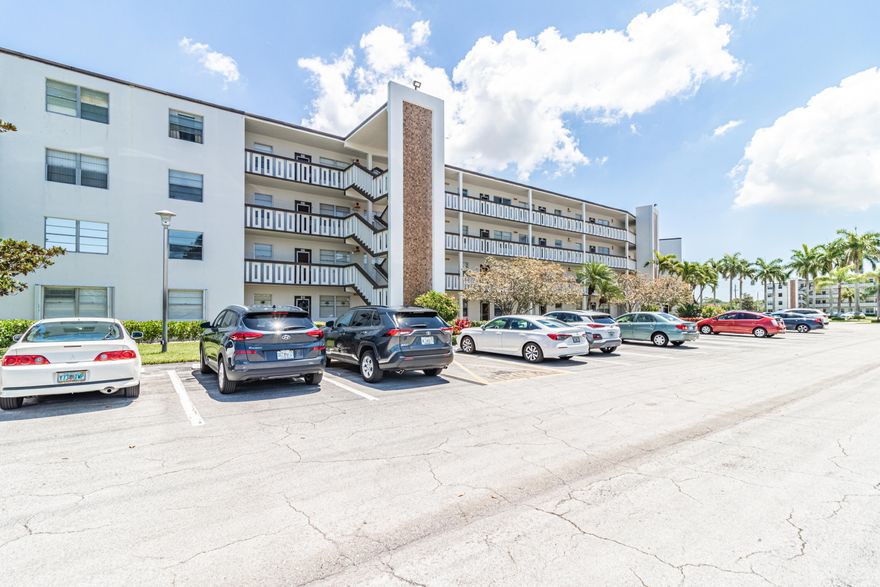 Enjoy lakefront views and fabulous, resort-style living in this charming condominium located in the desirable Century Village 55+ community and featuring tile and laminate flooring, updated fixtures and finishes and an open-concept floor plan for style and convenience. Roomy kitchen features plenty of storage space and efficient layout. Beautiful enclosed patio offers a sheltered spot for enjoying the lake view. You'll love the Century Village active adult lifestyle, with scores of amenities. Grand 125,000 sq ft clubhouse with fitness studio, party and game rooms and performance theater. Outdoors choose from 12 tennis courts, shuffleboard and bocce ball courts and resort-style main pool along with 13 additional satellite pools. Scenic lakes and ponds bring additional beauty to the grounds.