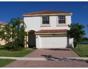 CORDOVA 5 GRANDE MODEL - Spacious Mediterranean style home with 5 Bedrooms, 2 1/2 baths and beautiful lakefront view. Master suite with sitting area and private balcony overlooking lake. Neutral colors throughout. Enjoy the many fabulous amenities of living in Olympia... Multi Million $$ Clubhouse with exercise room, relax by the resort-style pool and cabanas, hot tub/whirlpool spa, Kid's water park and playground, picnic areas. Indoor and Outdoor basketball, tennis lit for night play, beach volleyball. Walk or short bike ride to elementary and middle schools. Close and convenient to shopping, movies, restaurants and Wellington Green Mall. Enjoy biking, boating, public golf course and tennis in nearby Okeeheelee Park. Close to all year-round equestrian competition venues. See video tour.