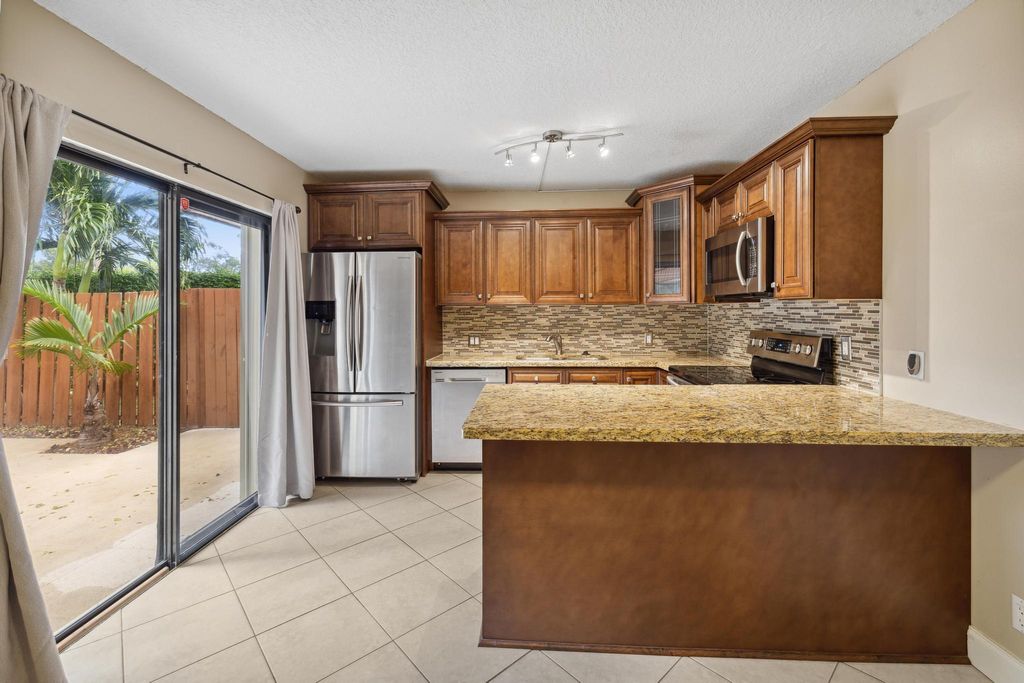 Photo of 3125 San Fernando Drive #34-C, Delray Beach, FL 33445 (MLS # R10937832)